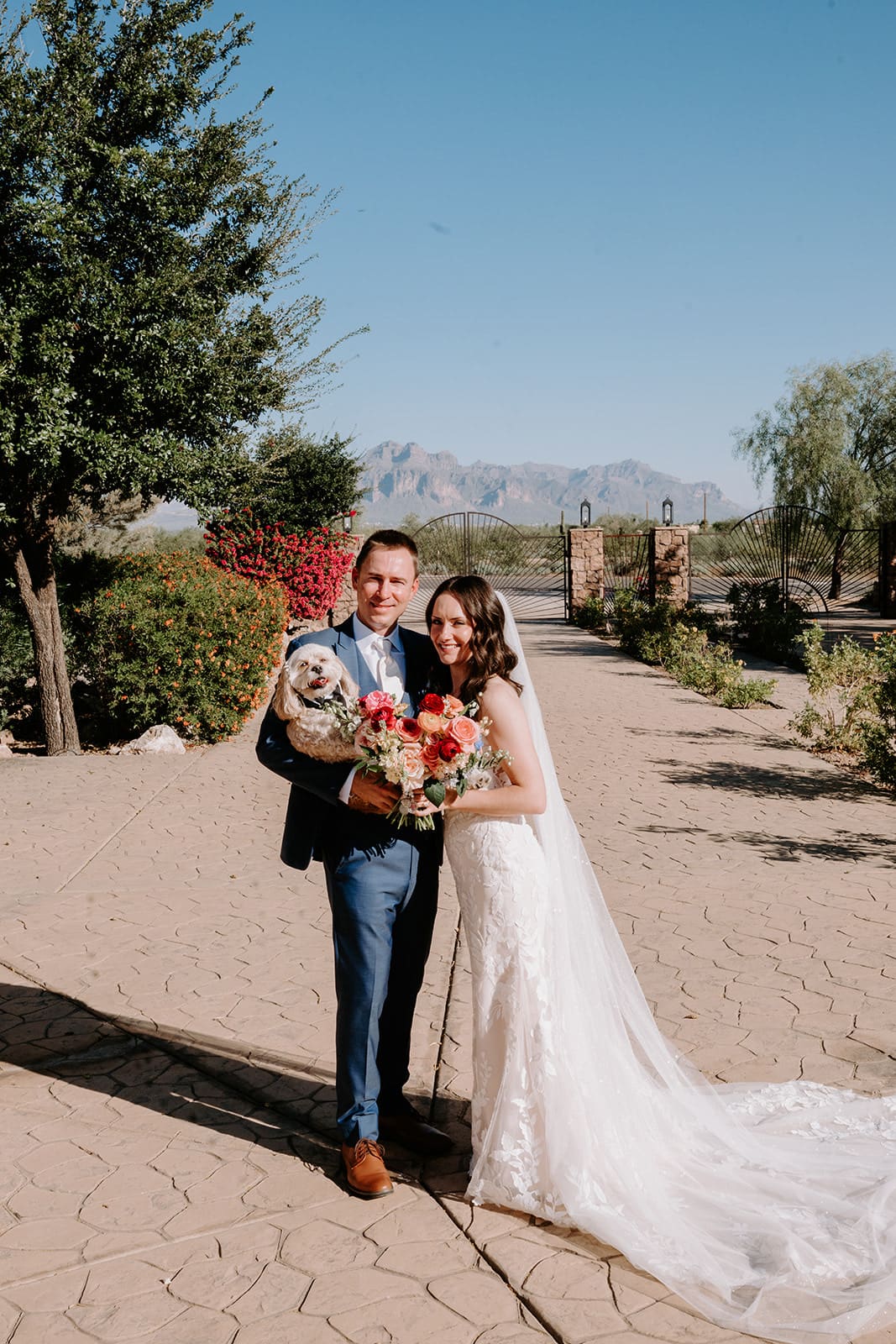 Couple with dog on Superstition Manor grounds