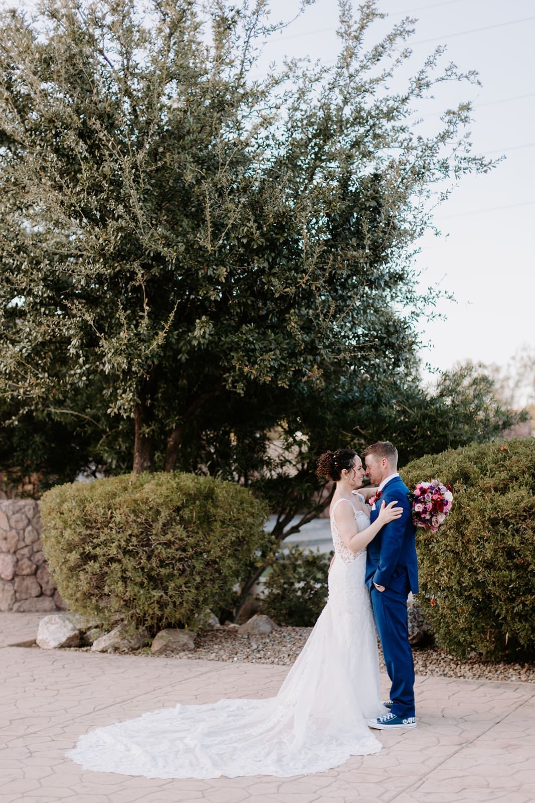 Bride and Groom portrait with blue suit
