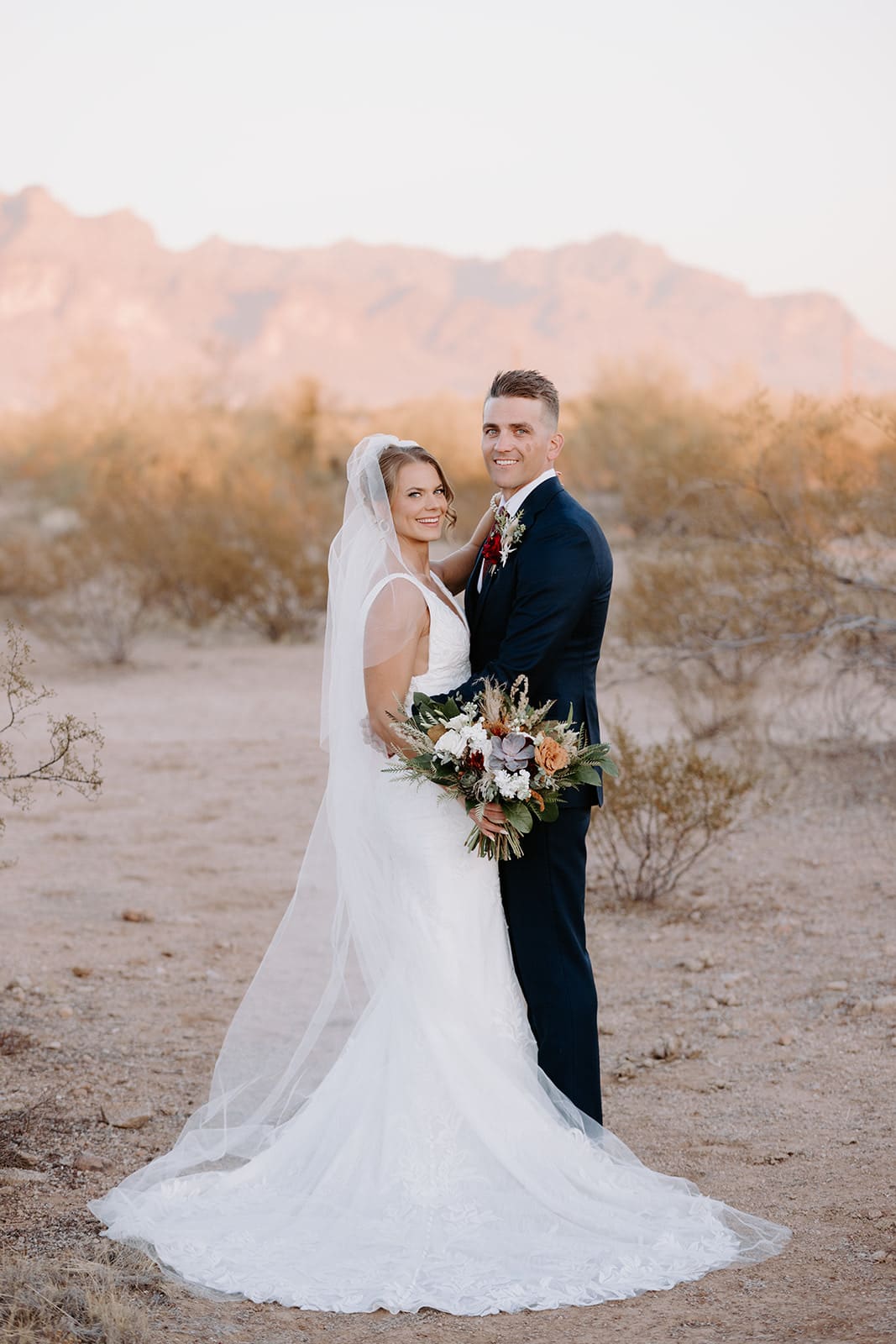 Bride and Groom with Superstition Mountain backdrop