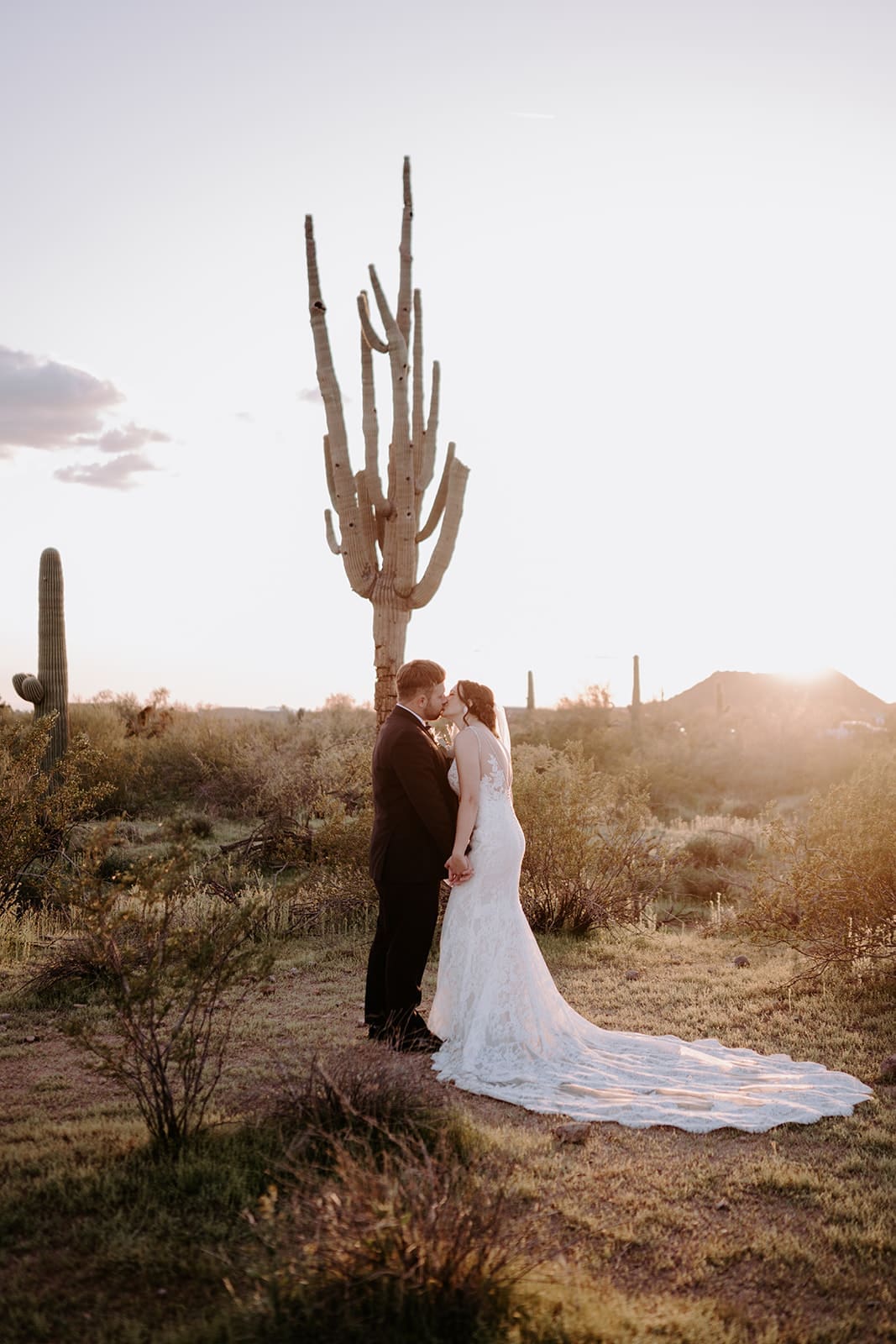 Bride and groom with desert scenery 