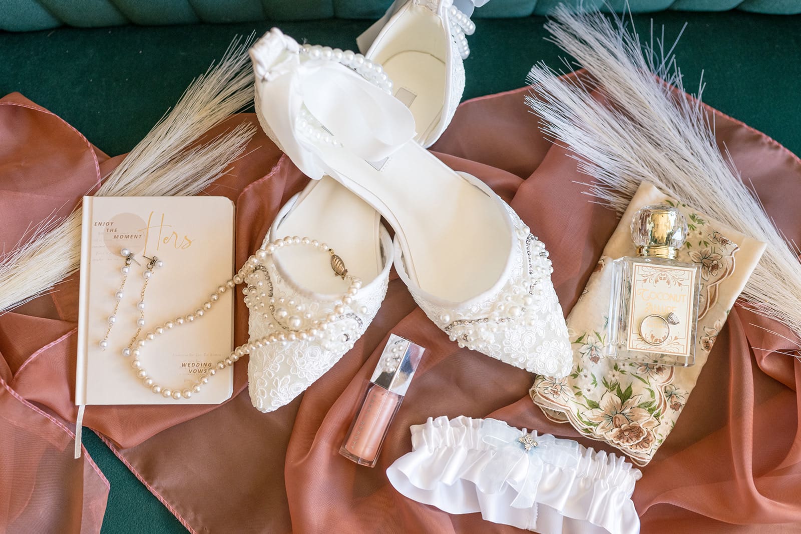 Flay lay photo with blush and white accents