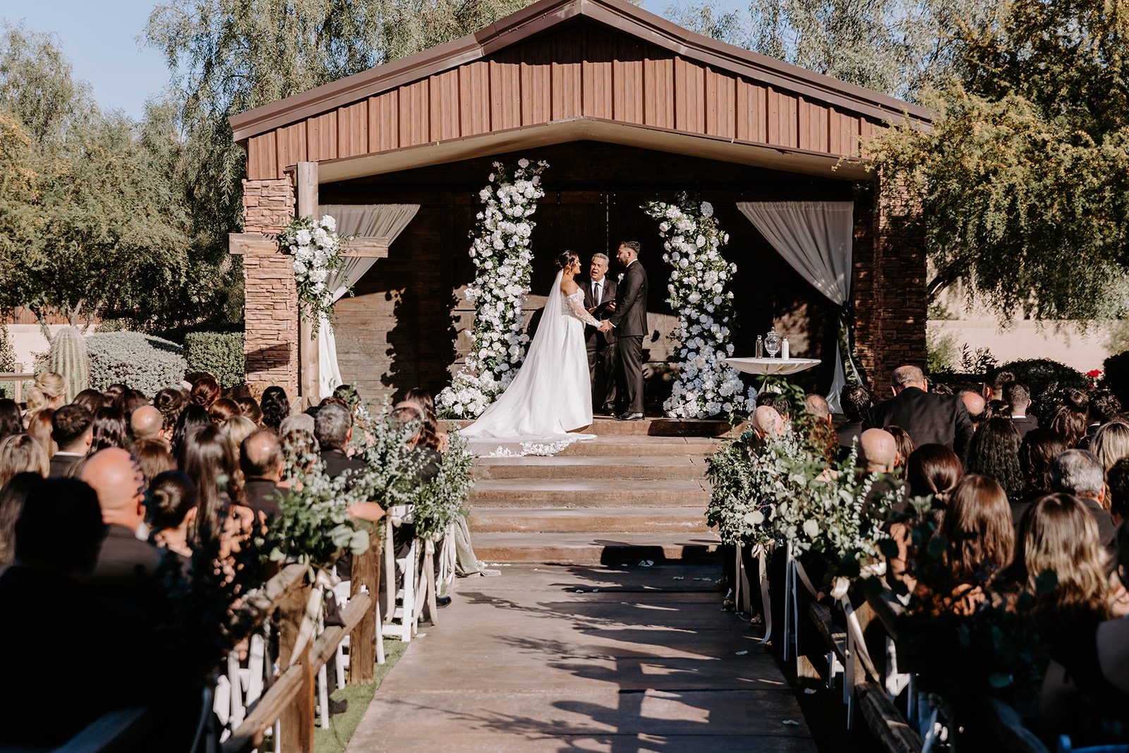 Wedding ceremony at Superstition manor Barn yard