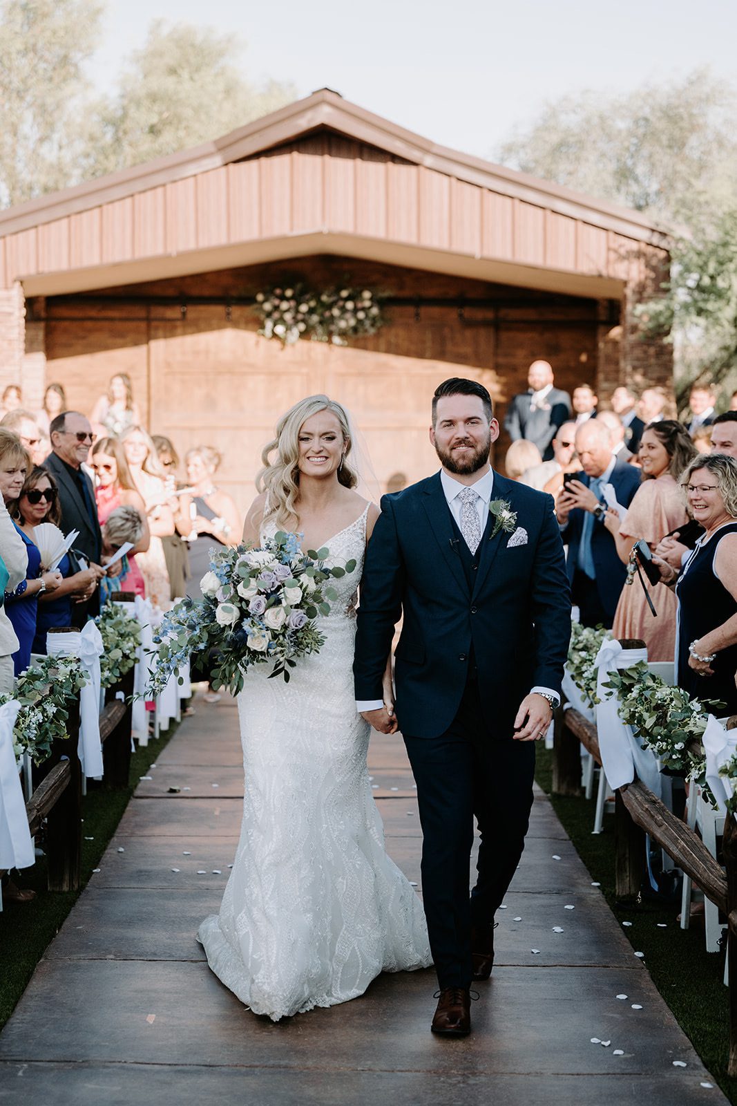 Bride and groom ceremony in the barn at Superstition Manor