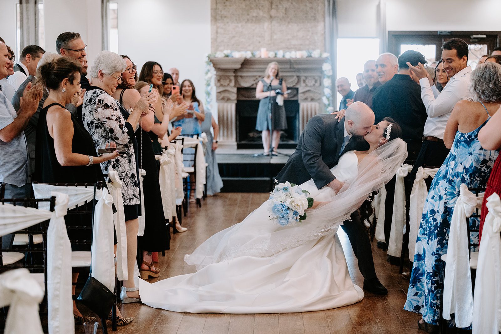 Bride and groom ceremony kiss