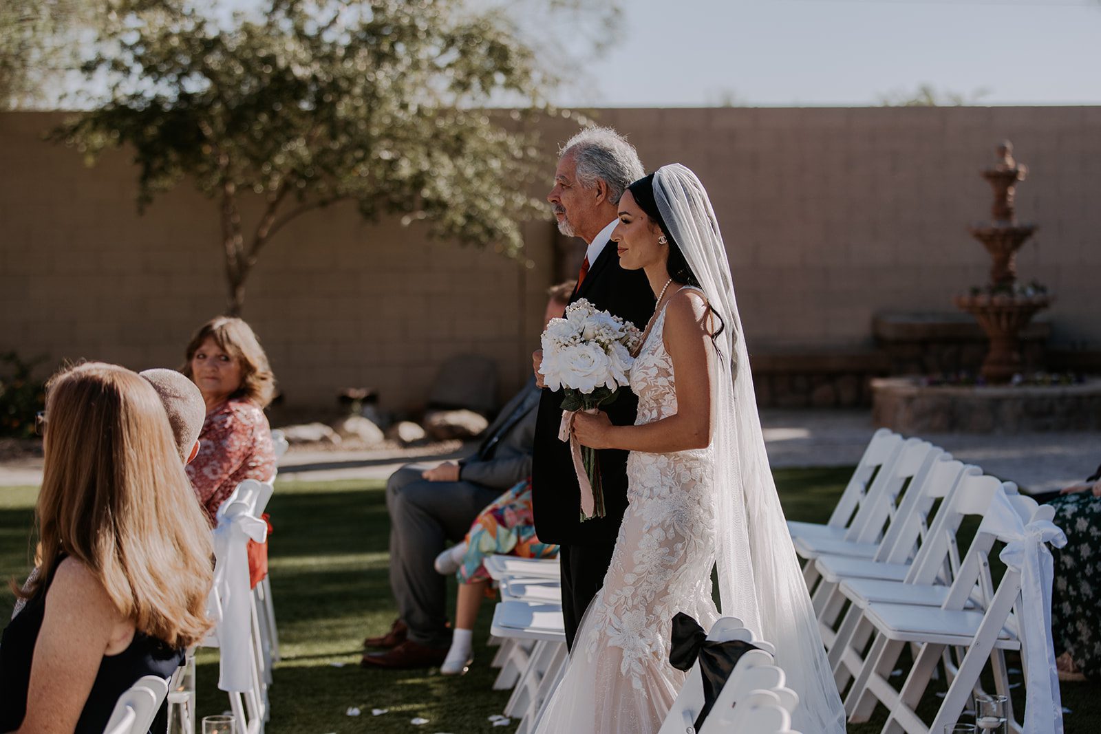 Bride and father walking down the aisle 