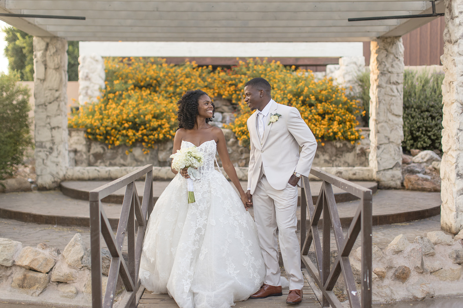 Bride and groom at the garden ceremony yard at superstition manor 