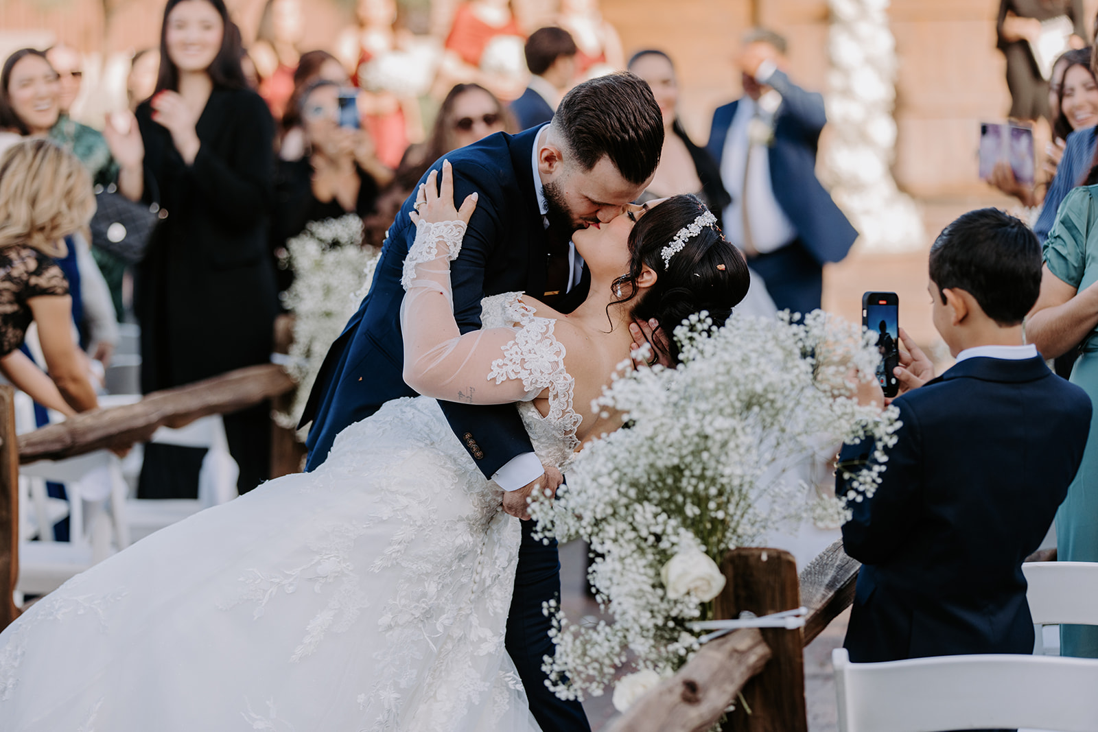 Bride and groom kiss