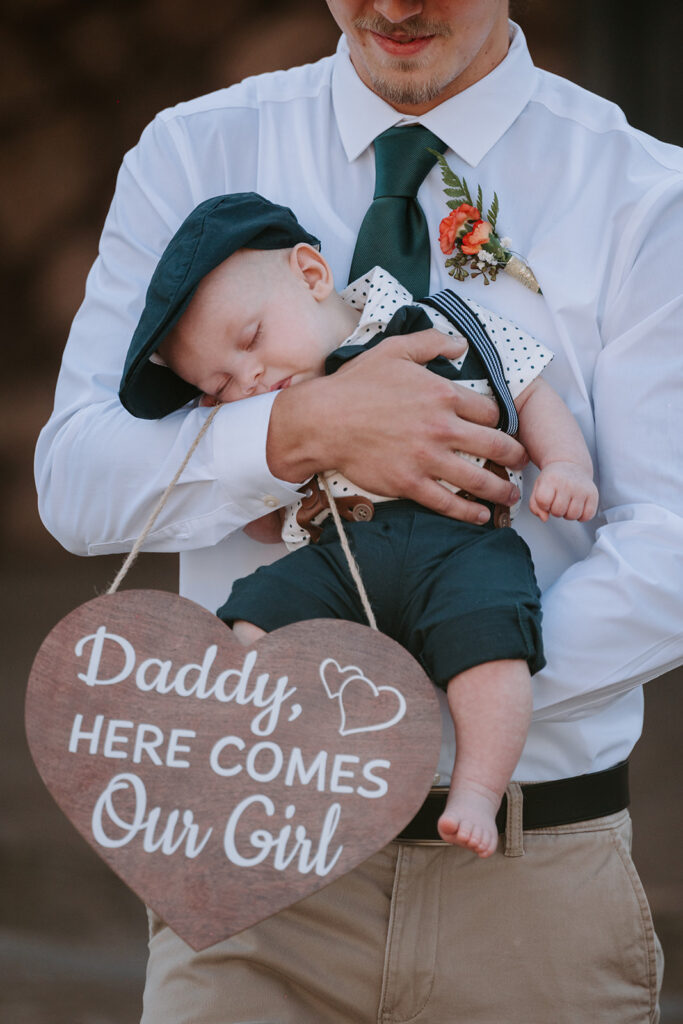 Baby walking down aisle 