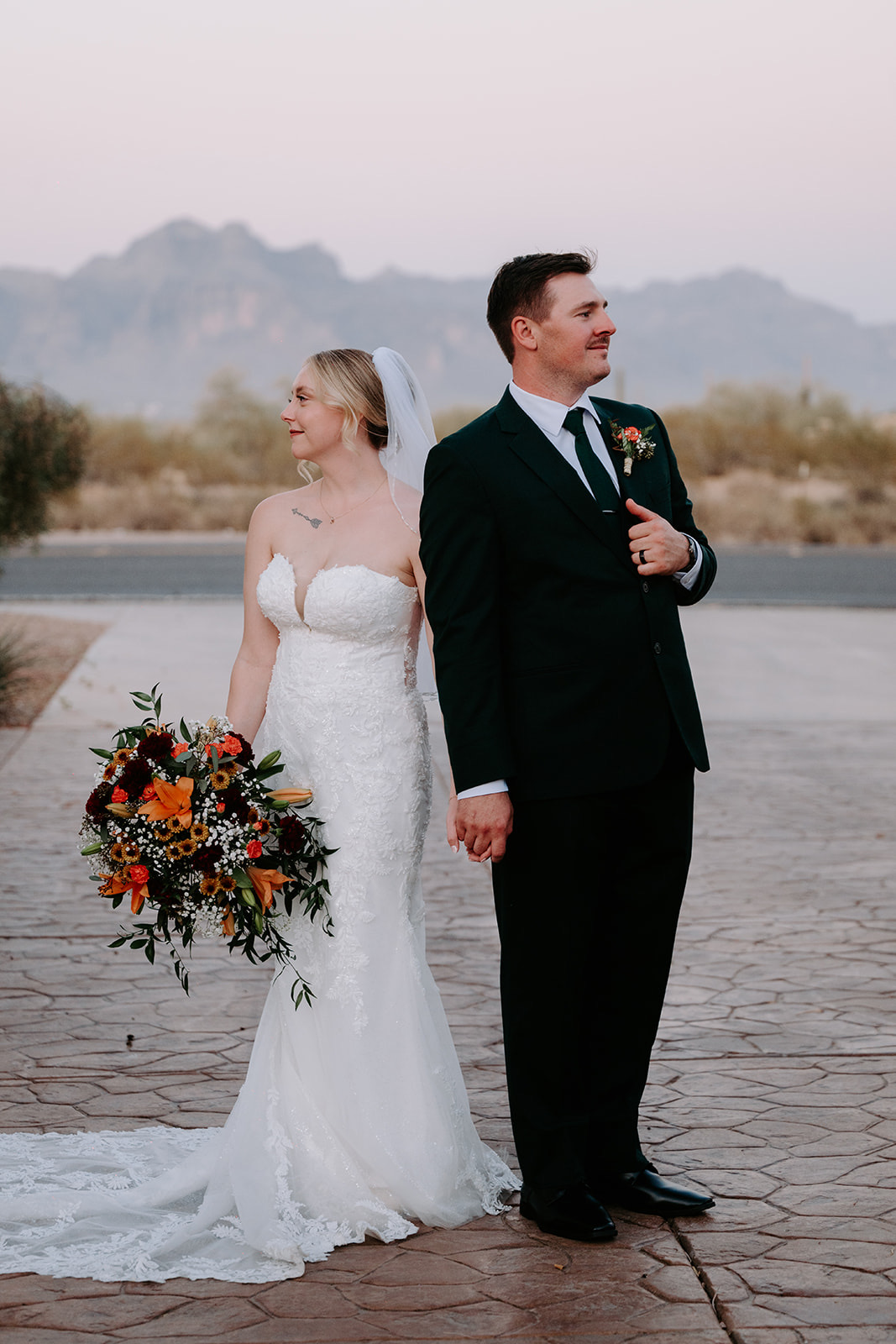 Bride and groom portraits on superstition manor grounds