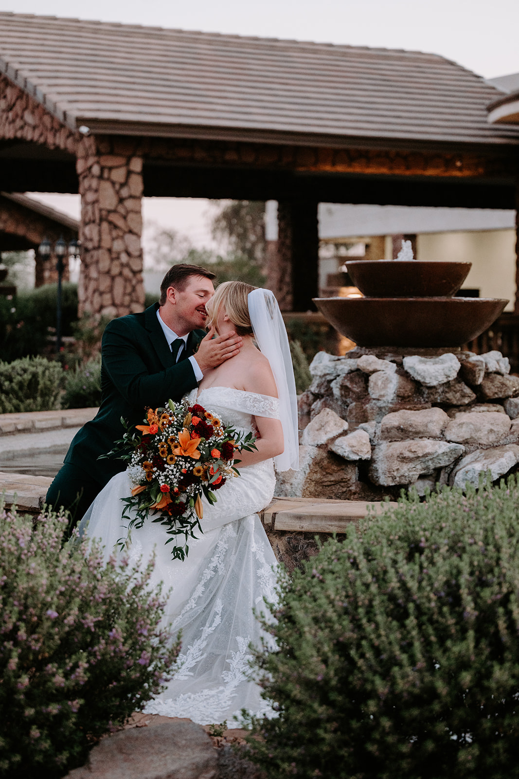 Bride and groom portraits on superstition manor grounds 