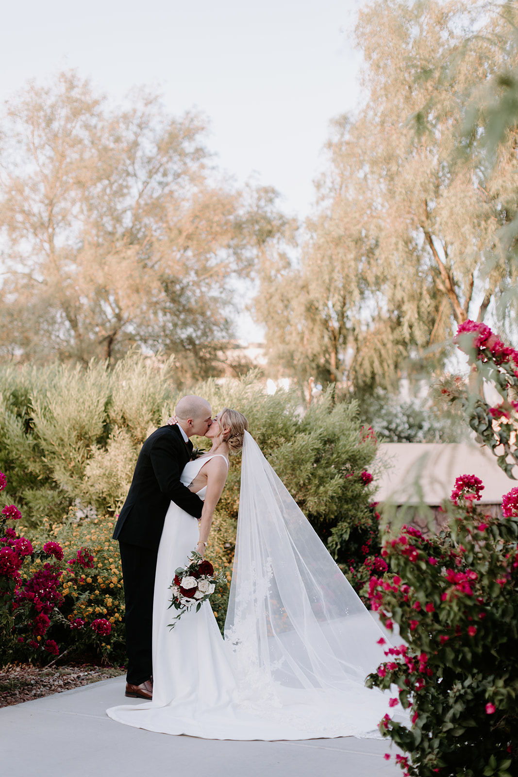 Bride and groom portraits on superstition manor grounds