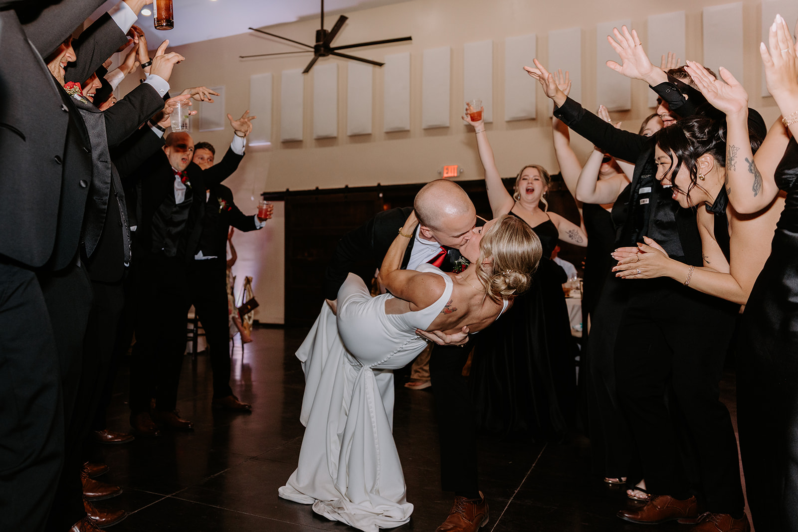 Bride and groom reception kiss