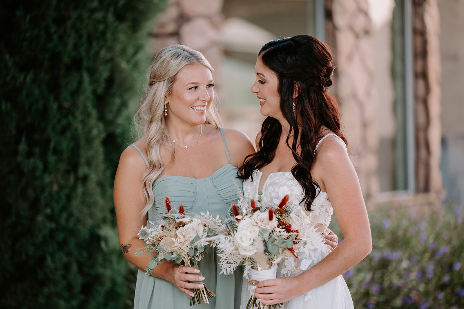 Bride and bridesmaid
